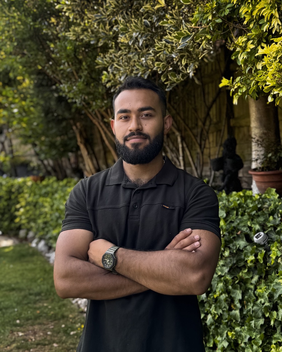 Ubaid, founder of Impeccable Gardens, in a client's garden